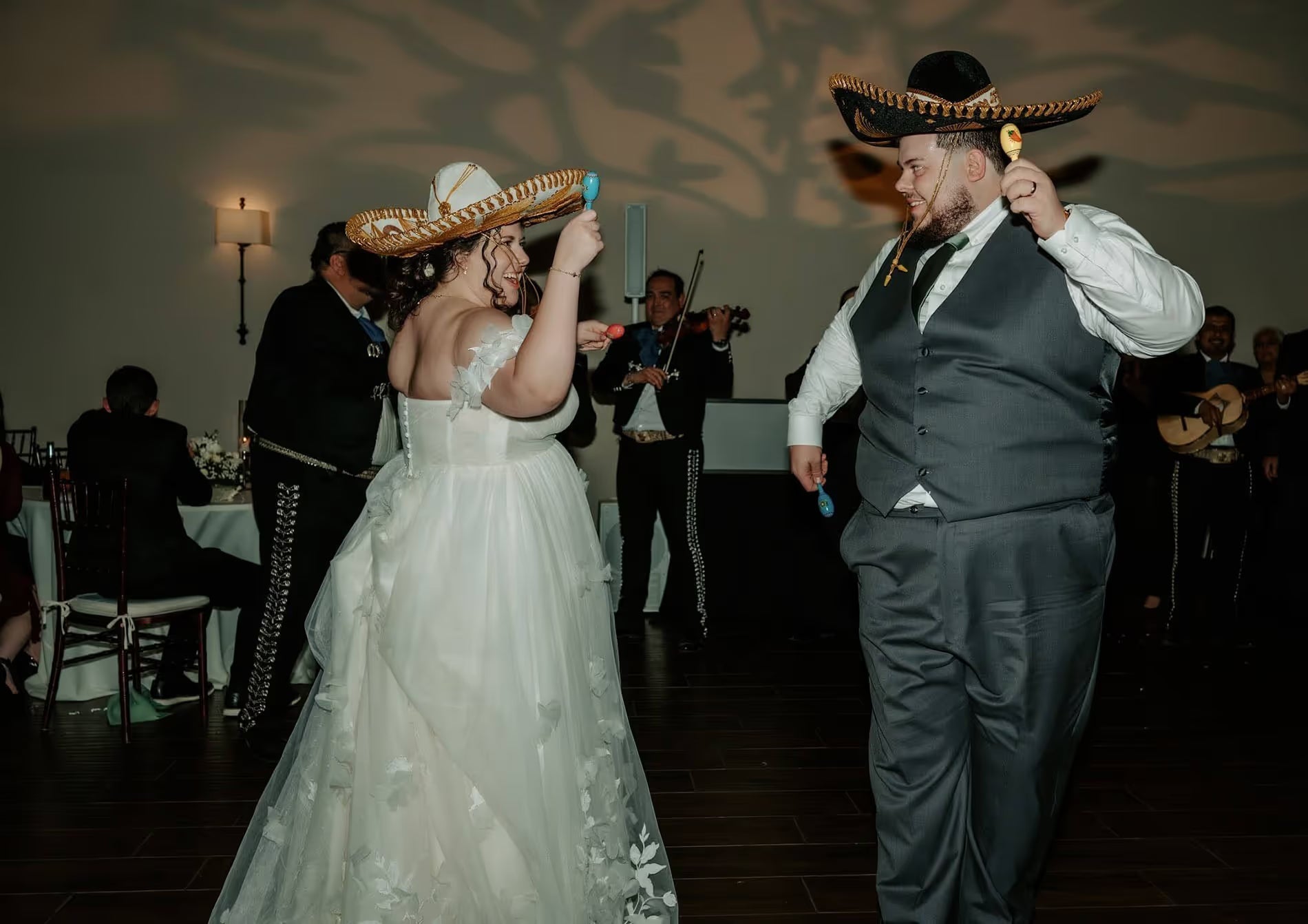 husband and wife dancing at wedding