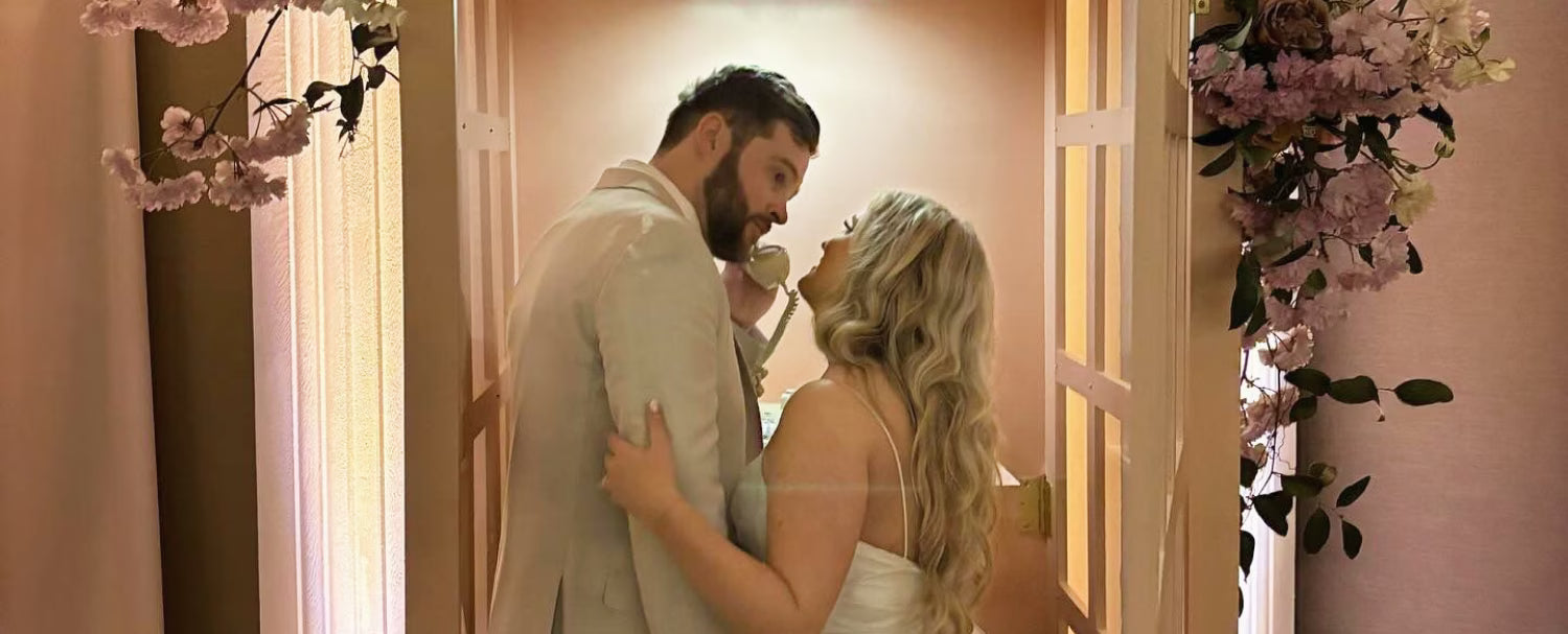 wedding couple holding rotary phone
