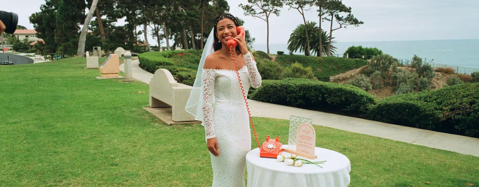 Bride Holding Orange Audio Guestbook from After The Tone