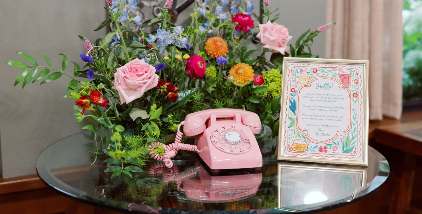 Quinceañera birthday table with pink audio guestbook