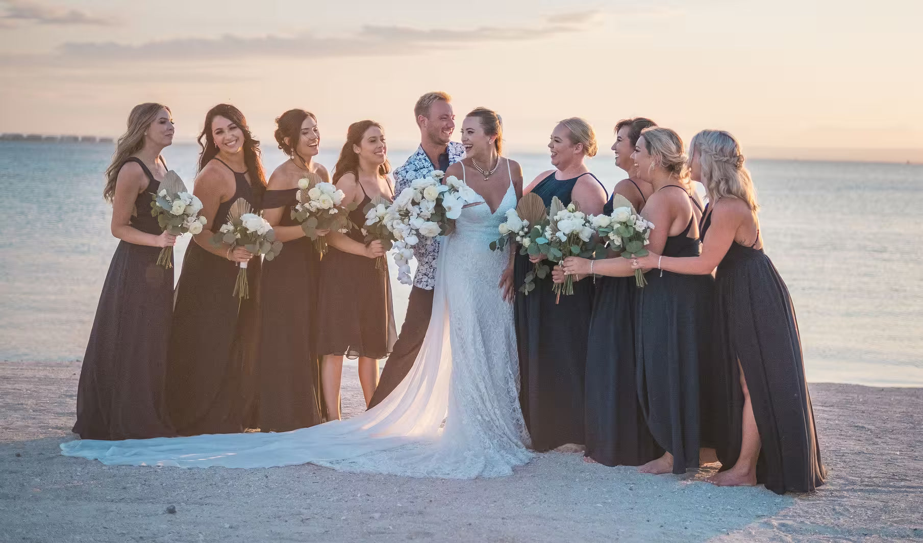 Wedding photo of bridesmaids at post wedding ceremony on beach