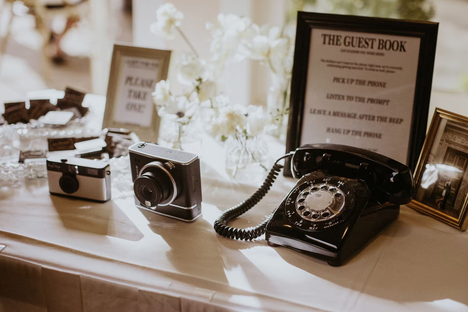 Black guest book on wedding table