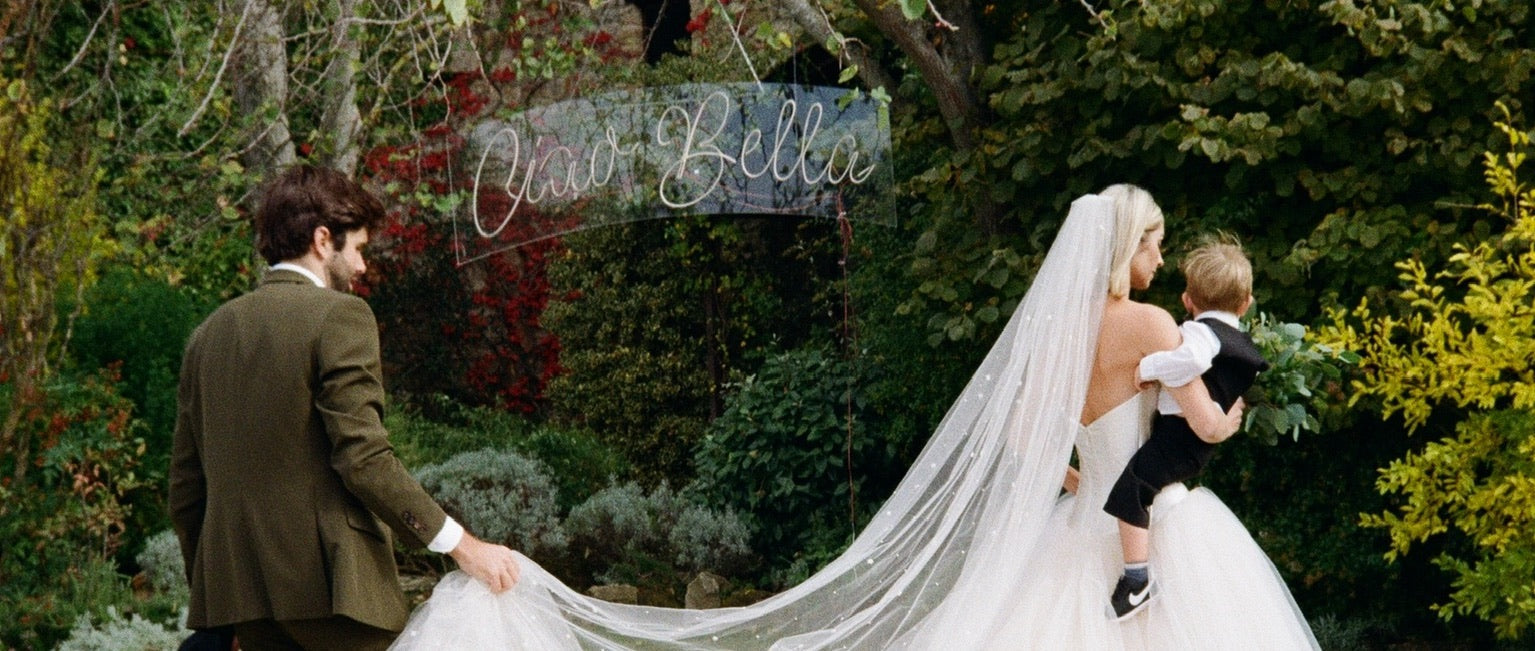 Bride and groom take wedding photos pre-ceremony at their castle venue.