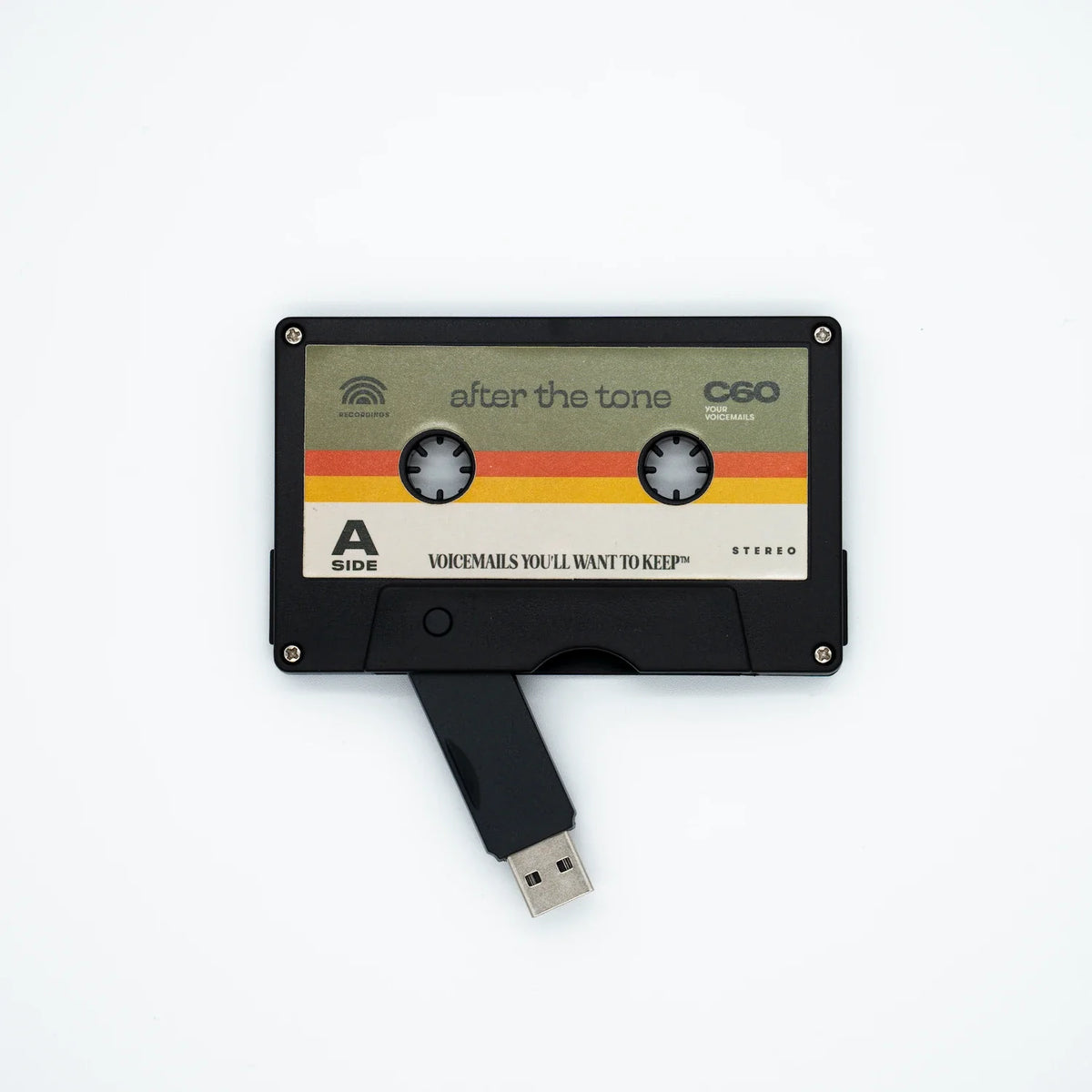 USB drive designed like a cassette tape on a white background