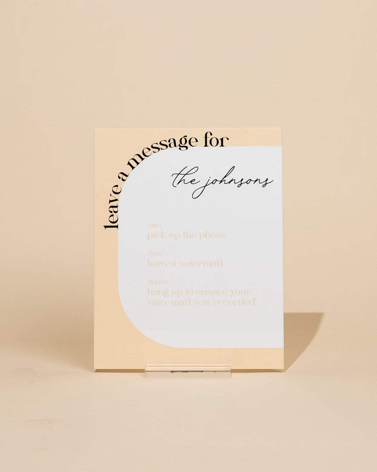 Card with 'Leave a message for the johnsons' text on a beige background
