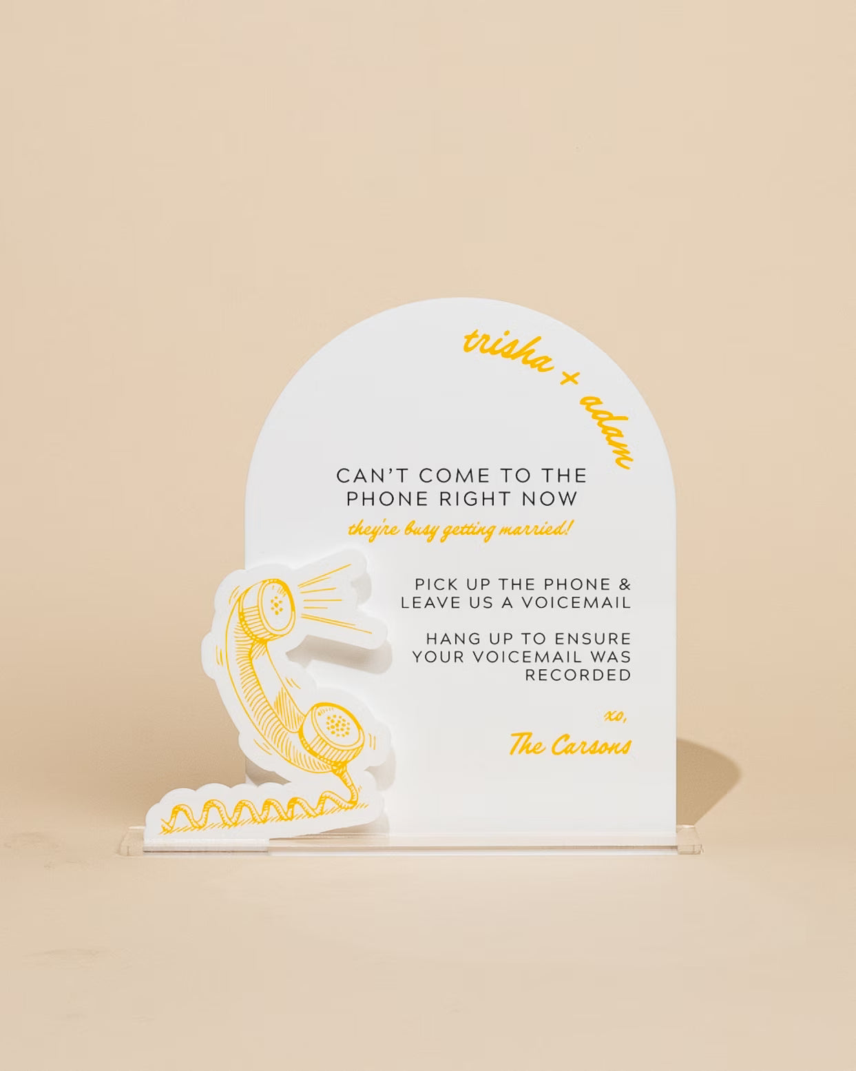 White and yellow voicemail message card on a beige background