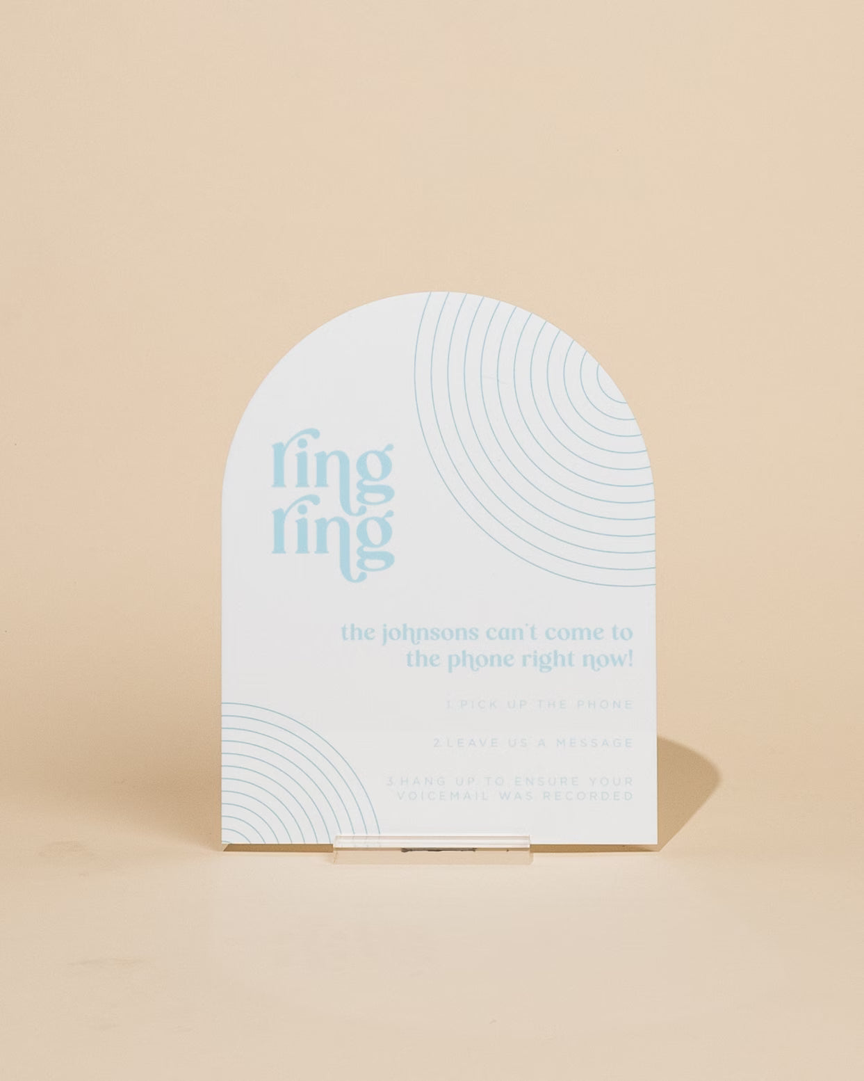 White product packaging with blue text on a beige background