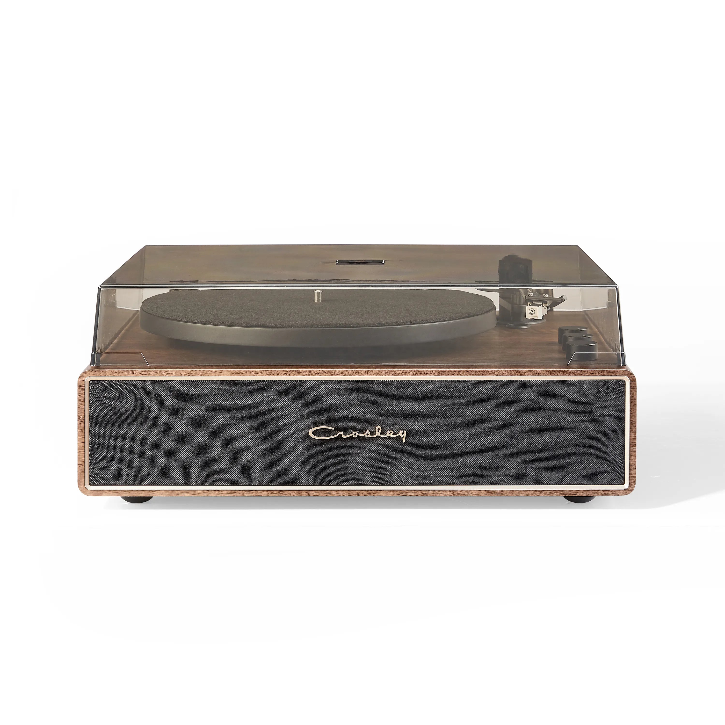 Wooden Crosley record player on a white background