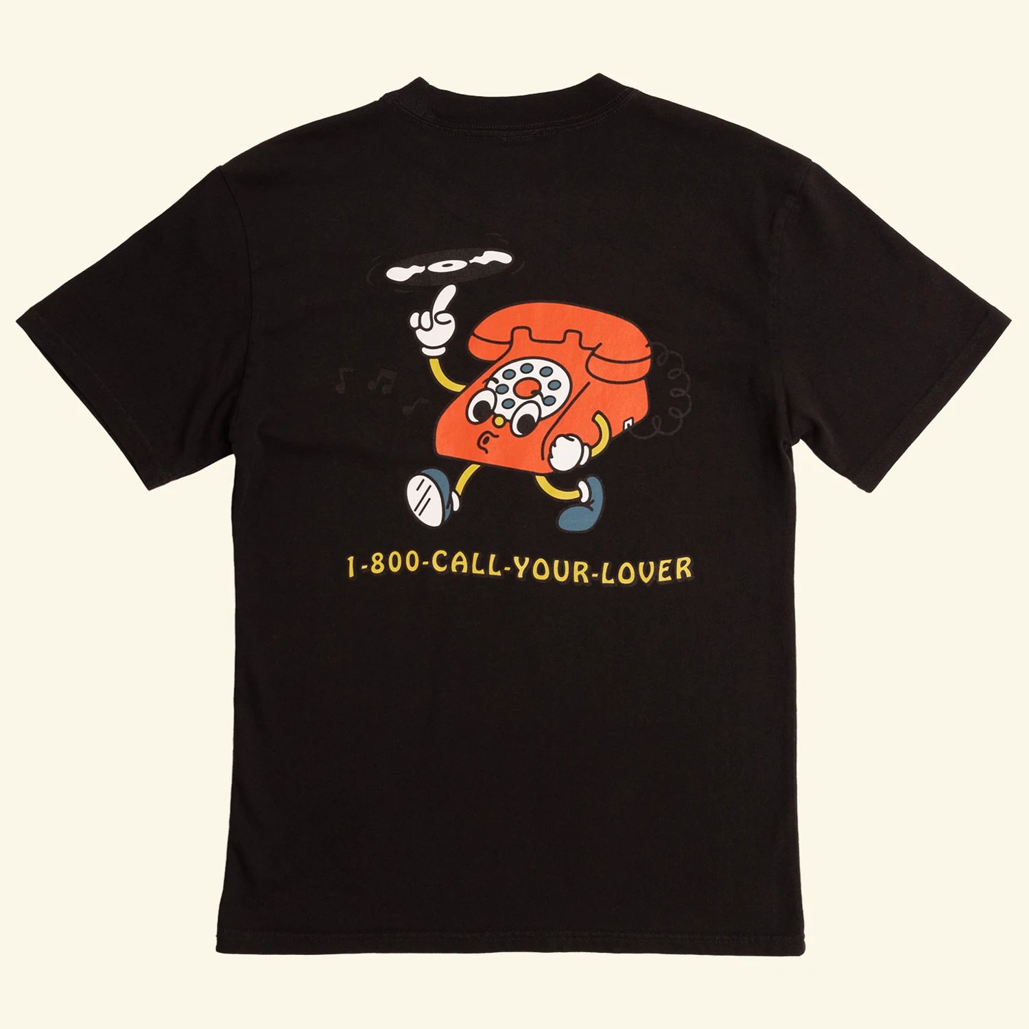 Black t-shirt with a cartoon phone and text on a beige background