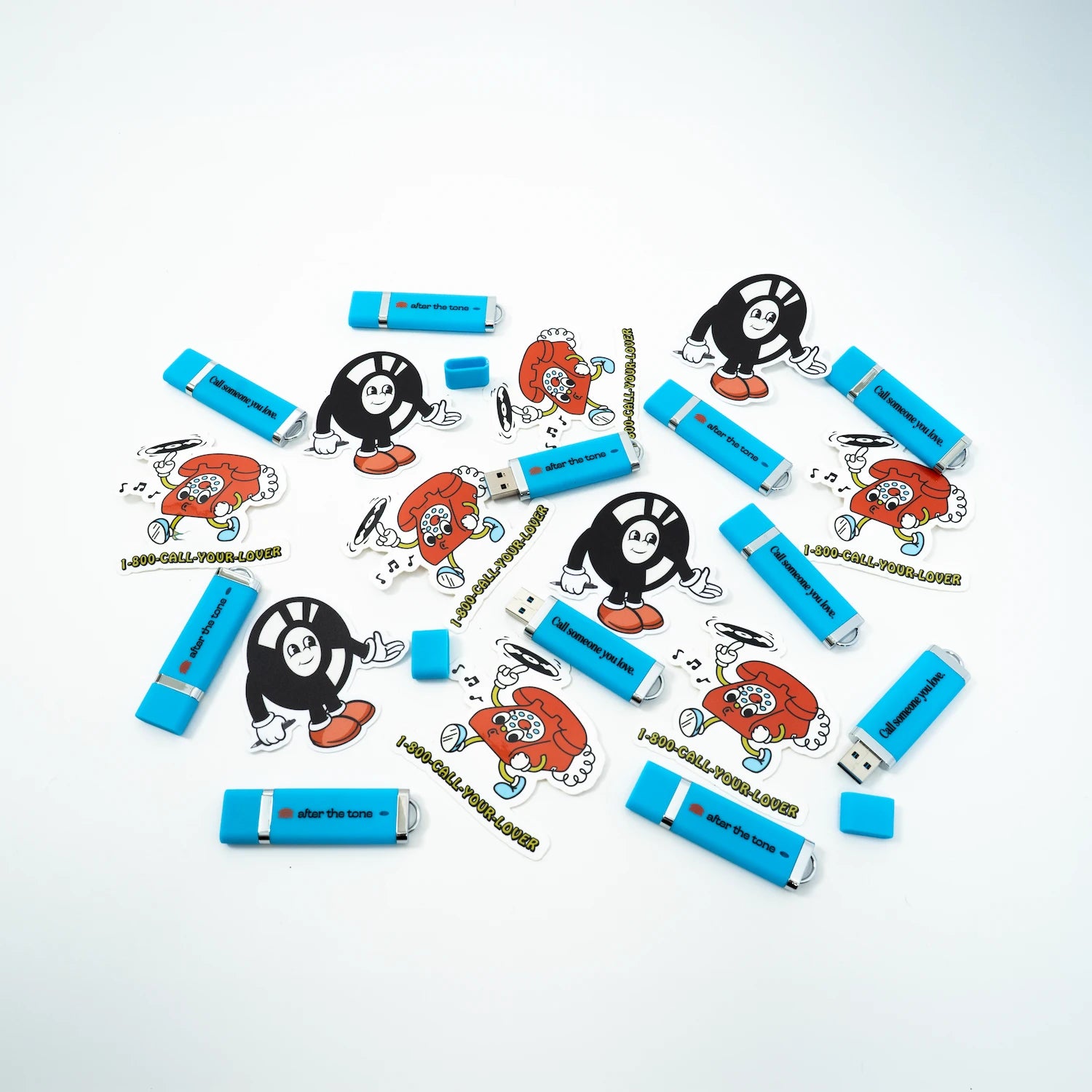 Collection of USB drives with cartoon characters on a white background