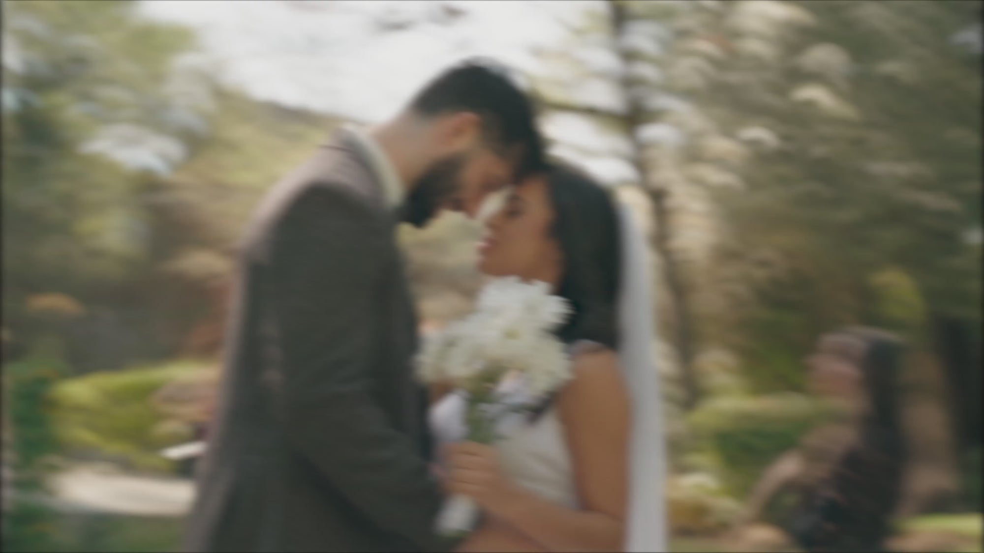 a man and woman celebrating their wedding day with loved ones.